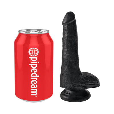 Black realistic dildo with suction cup base standing next to a red Pipedream branded soda can for size comparison.