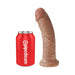 Tan realistic 8-inch dildo with suction cup base standing next to a red Pipedream branded soda can for size comparison.