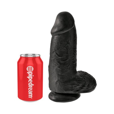 Black realistic 9-inch dildo with suction cup base next to a red soda can for size comparison.