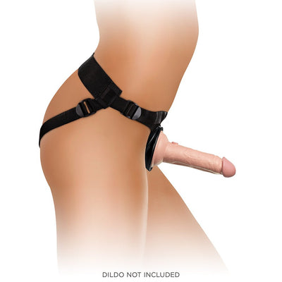 Side view of a black adjustable strap-on harness worn on the hips, designed for use with suction cup attachments.