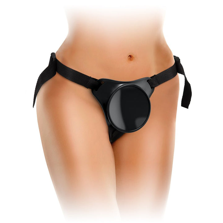 Close-up of a person wearing the King Cock Elite Beginner's Body Dock Strap-on Harness with adjustable black straps and a smooth suction dock plate.