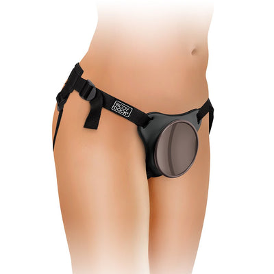 Adjustable black Body Dock strap-on harness with angled suction dock worn on hips.