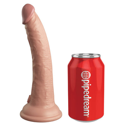 Realistic 7-inch dual-density silicone dildo in light skin tone with suction base next to a red Pipedream soda can for size comparison.
