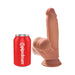 Tan 7-inch realistic triple density dildo with swinging balls next to a red Pipedream soda can for size comparison.