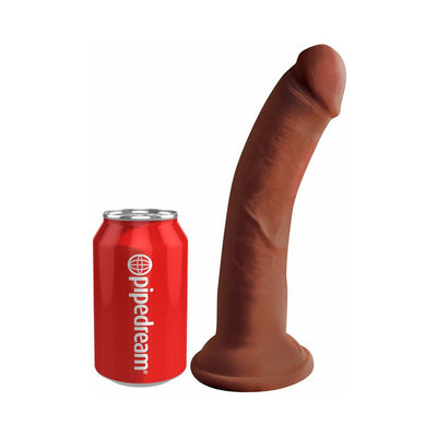 Brown realistic textured dildo with suction base next to a red soda can for size comparison