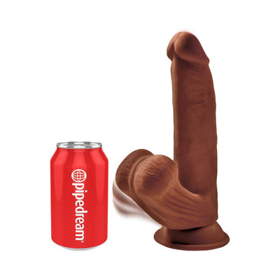 Realistic 8-inch brown triple density dildo with swinging balls and suction base next to a red Pipedream soda can for size comparison.