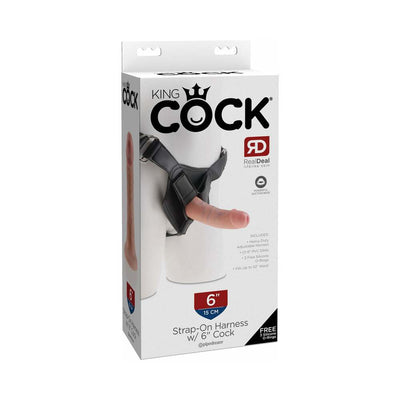 Packaging of King Cock Strap On Harness with 6-inch lifelike dildo and adjustable black harness shown on mannequin.