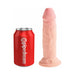 Beige King Cock Triple Density 6-inch dildo standing next to a red Pipedream soda can for size comparison.