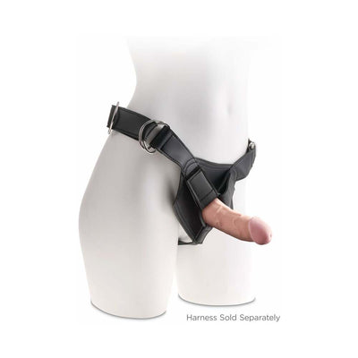 Beige realistic triple density dildo attached to a black adjustable strap-on harness on a white mannequin.