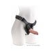 Beige realistic triple density dildo attached to a black adjustable strap-on harness on a white mannequin.