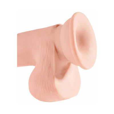 Beige realistic 7.5-inch dildo with balls and suction cup base for hands-free use.