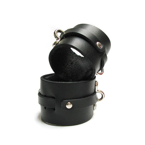 Pair of black leather Kinklab Bondage Basics ankle cuffs with soft lining and metal hardware for secure restraint.