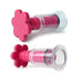 Pair of clear plastic nipple suction cups with pink flower-shaped twist handles for adjustable vacuum pressure.