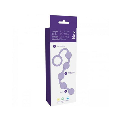 Packaging of Kinx Onyx black silicone anal beads showing product features and dimensions.