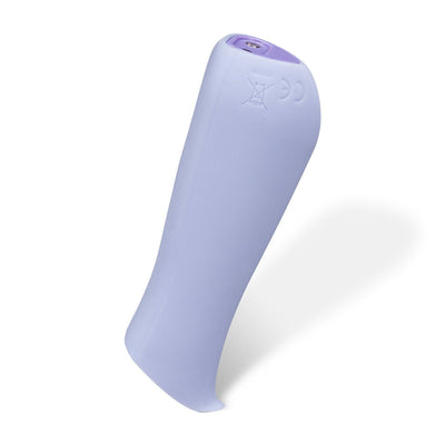 Lavender ergonomic silicone vibrator with a curved, prism-like shape and smooth matte finish standing on white background.