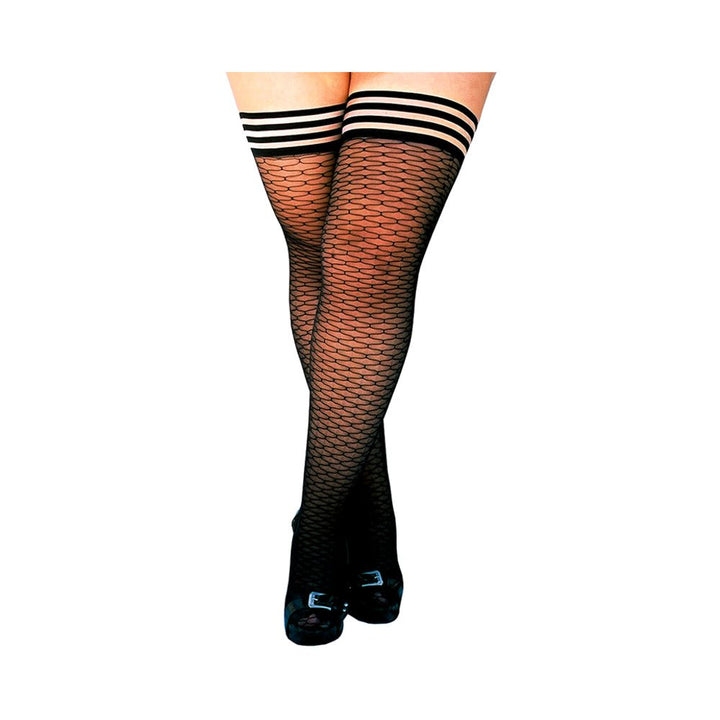 Black ribbed thigh high tights with striped silicone grip bands worn with black buckle shoes.