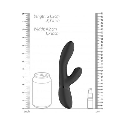 Black silicone clitoral rabbit vibrator with dual stimulation arms, shown with size comparison to a soda can and lipstick.
