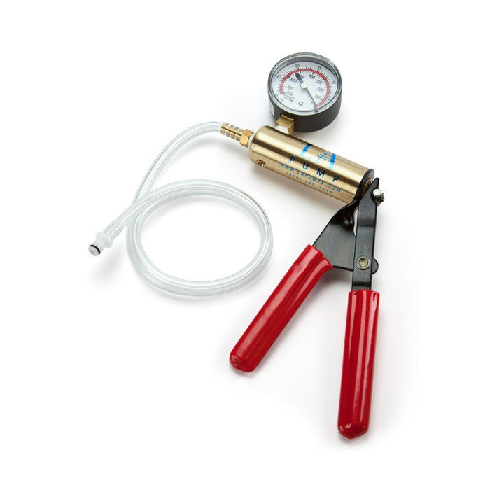 LA Pump Deluxe metal hand pump with red handles, pressure gauge, and clear hose for precise vacuum control.