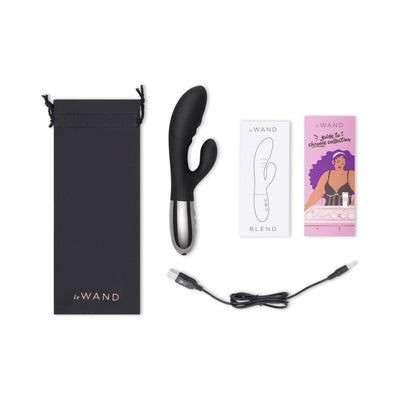 Le Wand Blend black dual-motor rabbit vibrator with USB charger, storage pouch, and user guides on white background.
