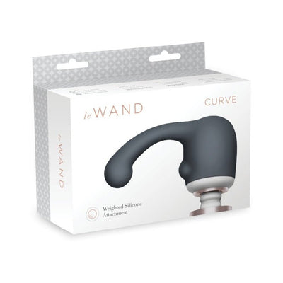 Le Wand Curve Weighted Silicone Attachment in black, designed for targeted massage with a curved shape, shown in retail packaging.