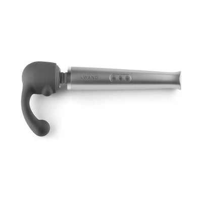 Le Wand massager with curved weighted silicone attachment in dark gray on a white background.