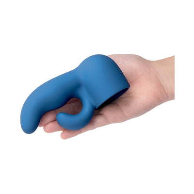Hand holding a blue silicone dual-weighted attachment designed for the Le Wand Petite massager.