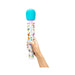 Hand holding Le Wand Unicorn Wand with colorful unicorn and rainbow designs and a blue silicone head.