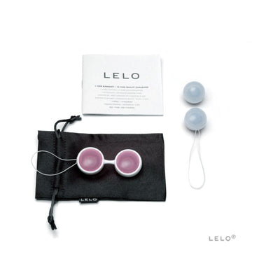 LELO Beads Mini set with two silicone kegel balls, black satin pouch, and warranty card on white background.