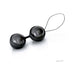 Glossy black LELO Beads Noir with silicone harness and retrieval loop on white background.