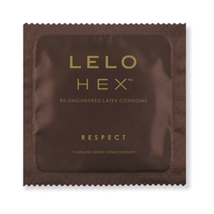 Single LELO HEX Respect XL natural latex condom in dark brown packaging with gold lettering.