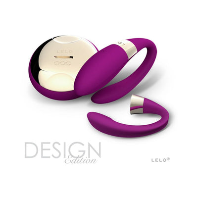 Purple Lelo Tiani 2 couples massager with wireless remote control and sleek gold accents on white background.
