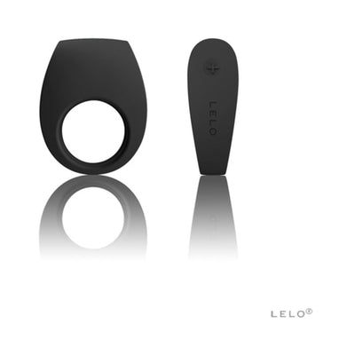 Black silicone Lelo Tor 2 vibrating couples' ring with remote control on a reflective white surface.