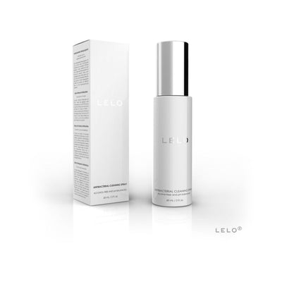 LELO Toy Cleaning Spray 60 mL bottle with silver cap and matching white packaging box on white background.