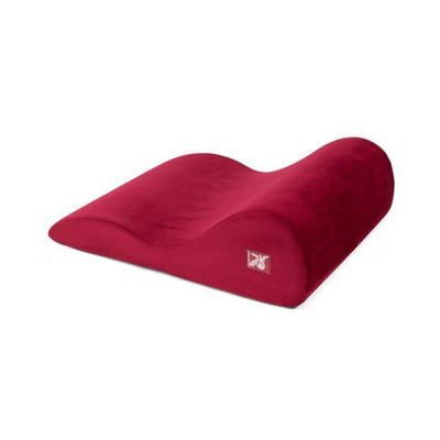 Liberator Hipster Merlot sex pillow with contoured curves and plush micro-velvet cover in deep red color.