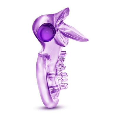 Purple vibrating double strap cock ring with tongue-shaped stimulator and textured surface for enhanced pleasure.