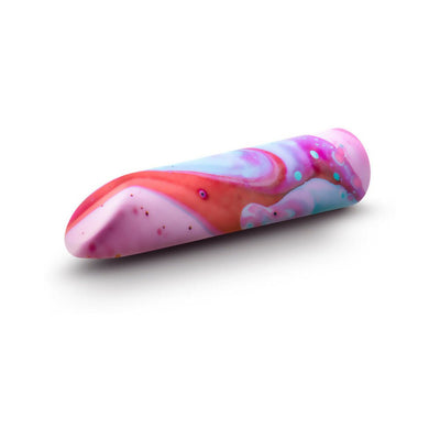 Limited Addiction Fascinate Power Vibe in peach with a smooth, colorful marbled design and sleek tapered shape.