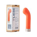 Orange silicone G-spot massager with curved head and silver base next to its eco-friendly cardboard packaging.