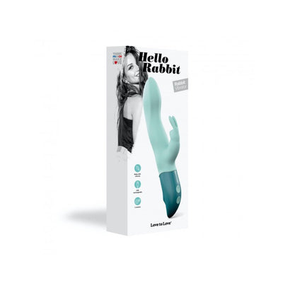 Packaging of Love To Love Hello Rabbit vibrator in mint green with ergonomic design and dual motors shown on box front.