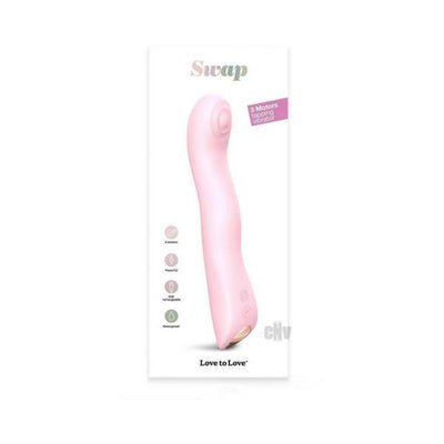 Pink silicone Love To Love Swap triple motor tapping vibrator with curved ergonomic design on white background.