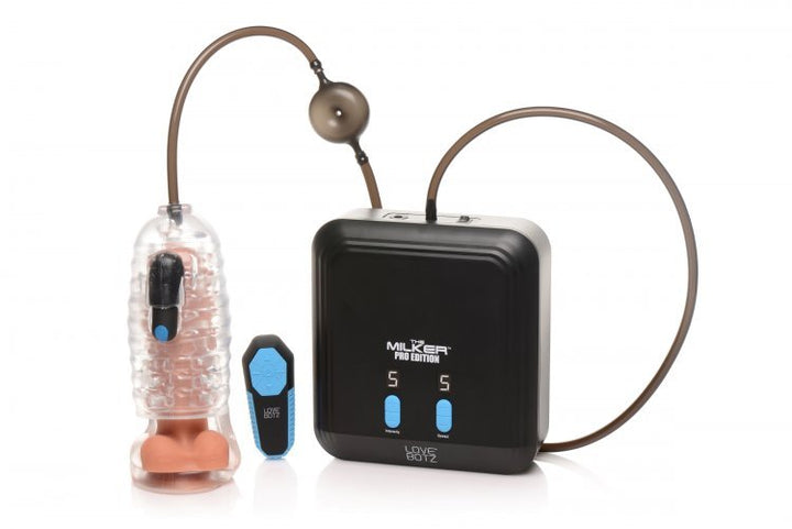 Clear textured sleeve with bullet vibrator, connected to a black motor unit and remote control with tubing for suction and stimulation.