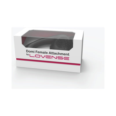 Lovense Domi Female Attachment in white and pink box with clear window showing black silicone stimulator inside.