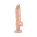Beige PVC vibrator with pierced head detail, textured shaft, and suction cup base for hands-free use.