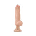 Beige PVC vibrator with pierced head, textured shaft, and suction cup base for hands-free use.