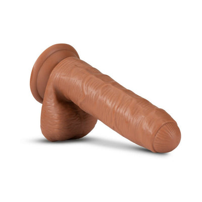 Realistic mocha-colored dildo with suction cup base and detailed texture for lifelike experience.