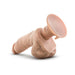 Beige realistic vibrating dildo with suction cup base on white background.