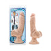 Beige realistic vibrating dildo with suction cup base shown in and out of packaging with doctor illustration on label.