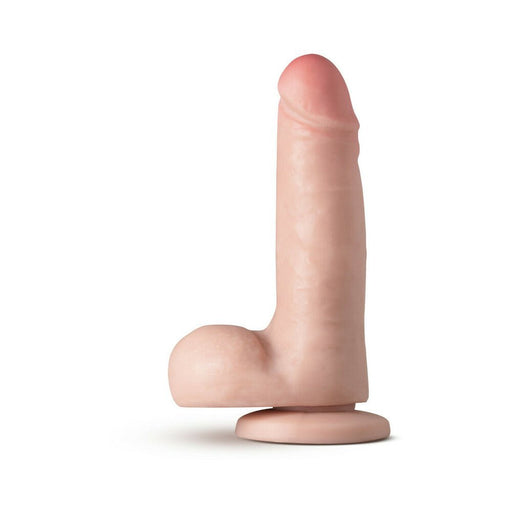 Realistic vanilla-colored dildo with suction cup base and detailed texture, standing upright on white background.