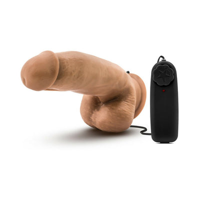 Mocha-colored 7-inch realistic vibrating dildo with remote control and adjustable speed dial on white background.