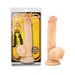 Beige realistic dildo with suction cup base shown inside and outside of packaging featuring construction worker illustration.