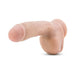 Beige realistic dildo with suction cup base and detailed texture for lifelike feel and versatile use.